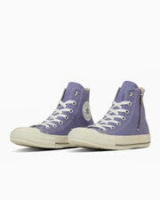 Pair of purple canvas high-top sneakers with white laces shown on a white background.