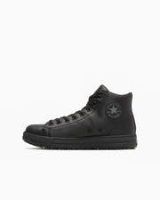 Side view of a black leather high-top sneaker (ALL STAR PS II HI) on a white background.