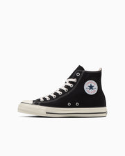 Black high-top canvas sneaker shown in side profile on a white background.