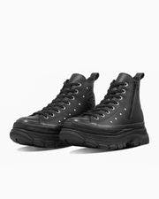 Black leather high-top sneakers shown from a front-left angle on a white background.