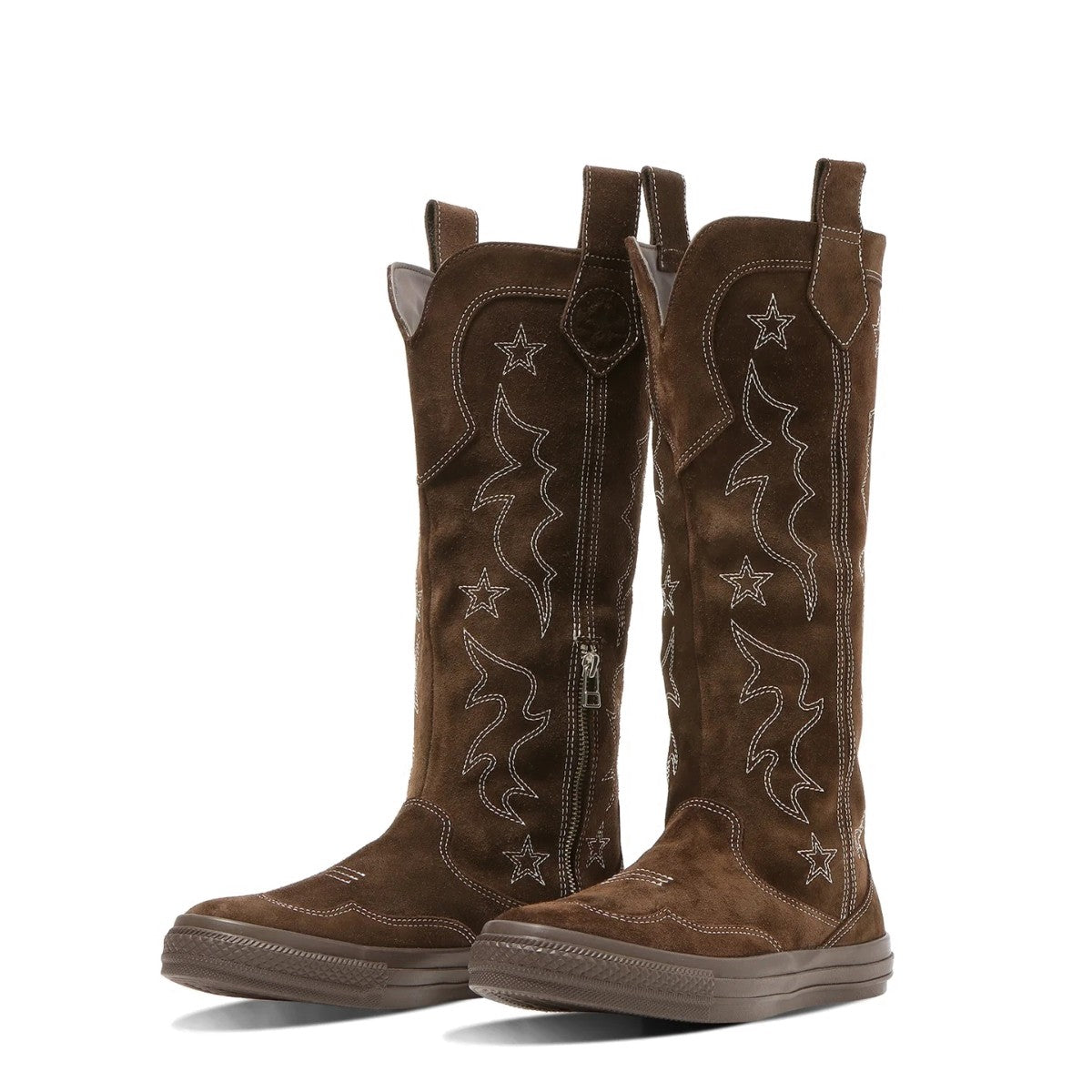 Pair of brown leather Western-style tall Converse boots with decorative stitching and side zippers on a white background.