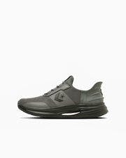 Side profile of a dark-colored CAVESTAR SLIT SLIDE sneaker on a white background.