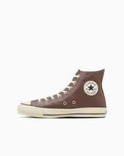 Brown leather high-top sneaker shown in side view on a white background.