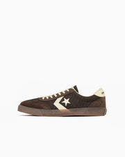 Side view of a brown ROADCLASSIC SK OX canvas sneaker on a white background.