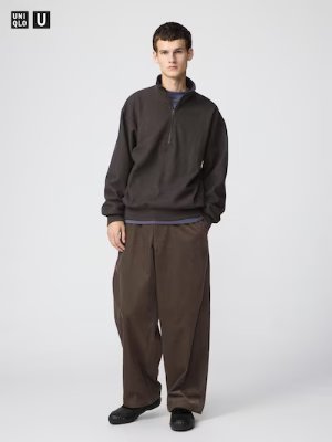 Male model shown full-length wearing the corduroy utility pants against a plain light background.