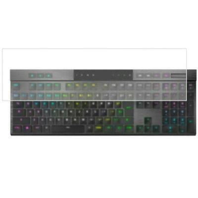 Transparent plastic keyboard cover placed over a CORSAIR K100 AIR keyboard with RGB lighting visible.