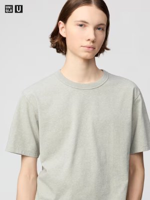 Model wearing a gray crew-neck cotton T-shirt visible from the chest up.