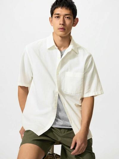 Male model wearing the cotton-linen men's shirt in a light color, front view with visible chest pocket.