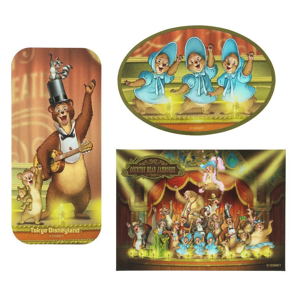 Three paper stickers of Country Bear Theater characters performing on stage shown on a white background.