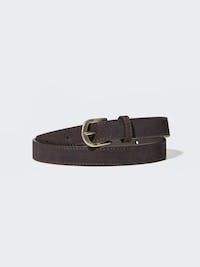 A cow suede long belt coiled on a light background showing the metal buckle.