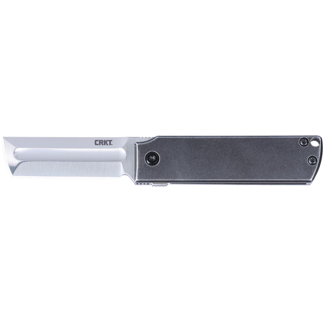 Side view of a CRKT frame-lock folding pocket knife with the blade extended on a white background.