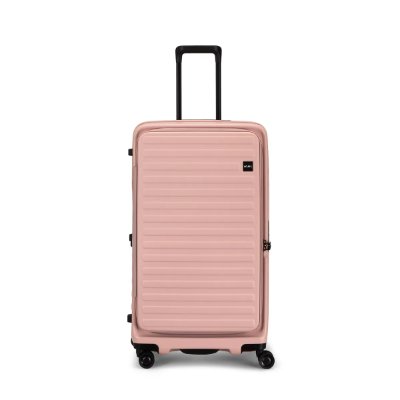 Front view of the Cubo Fit - Rose suitcase with its telescoping handle extended and four wheels visible.