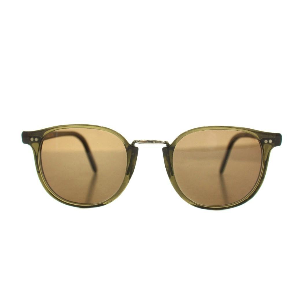 Front view of khaki Cutler & Gross men's sunglasses with brown lenses on a white background.