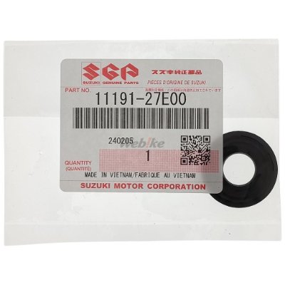 A black washer in a clear plastic bag next to a Suzuki Motor Corporation label showing part number 11191-27E00.