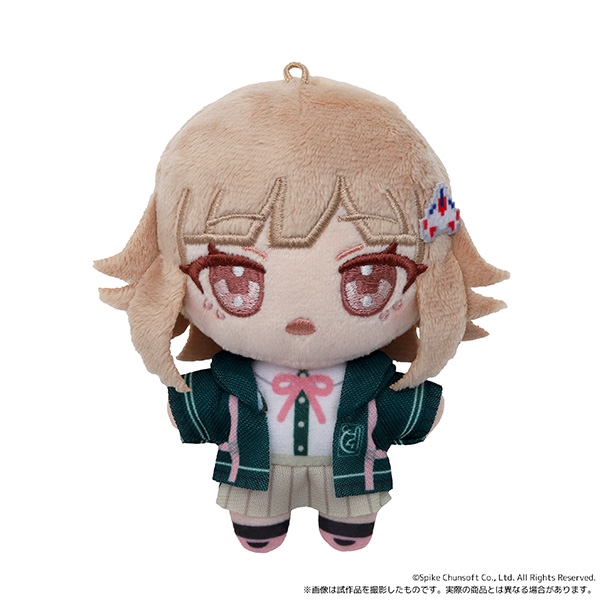 Front view of the Danganronpa Nanami Chiaki plush mascot showing the embroidered face, green jacket, skirt, and a hanging loop.
