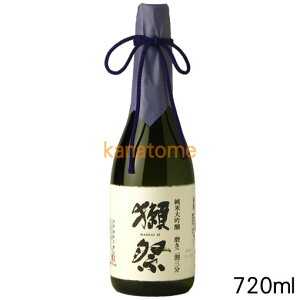 A bottle of 獺祭 (Dassai) 純米大吟醸 磨き二割三分 sake, 720ml, showing the label and cloth-wrapped neck.