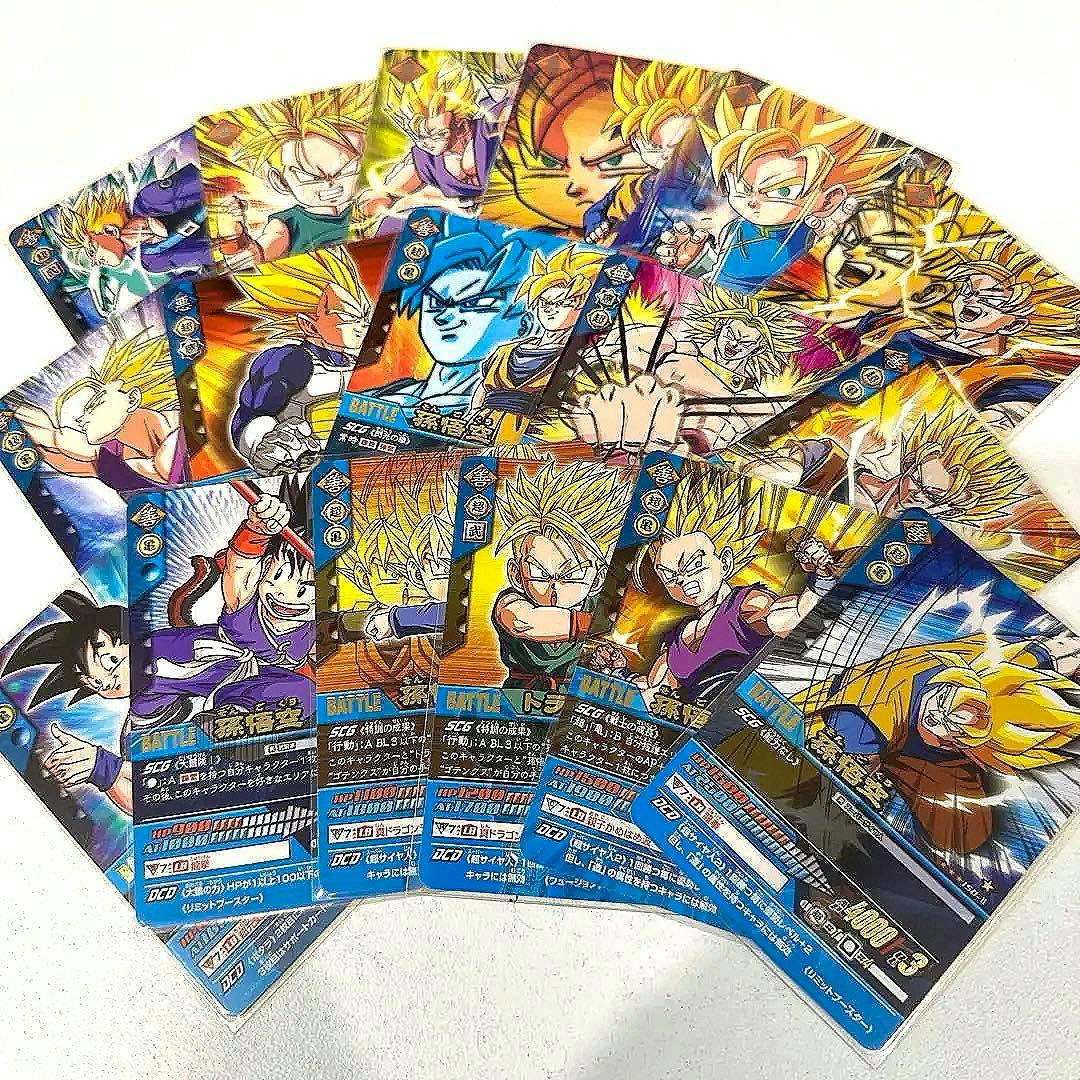 A fanned spread of Dragon Ball Z Data Carddass trading cards laid on a white surface showing character artwork and blue stat panels.