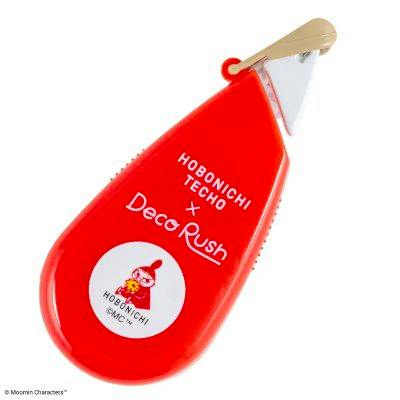 A red Deco Rush plastic tape dispenser with Hobonichi Techo branding and a small Little My illustration.