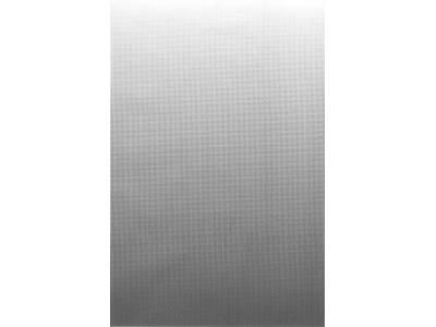 Photograph of a rectangular screen tone sheet showing a vertical gray gradient of small halftone dots.