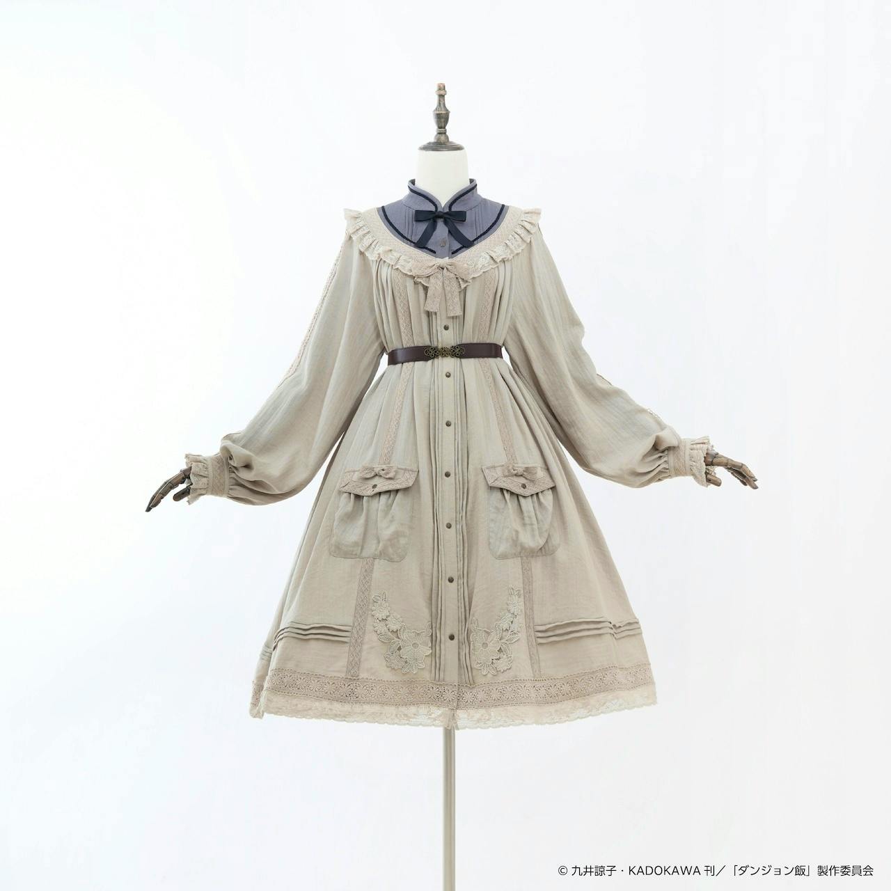 Front view of the collaboration embroidered one-piece women's dress displayed on a mannequin.