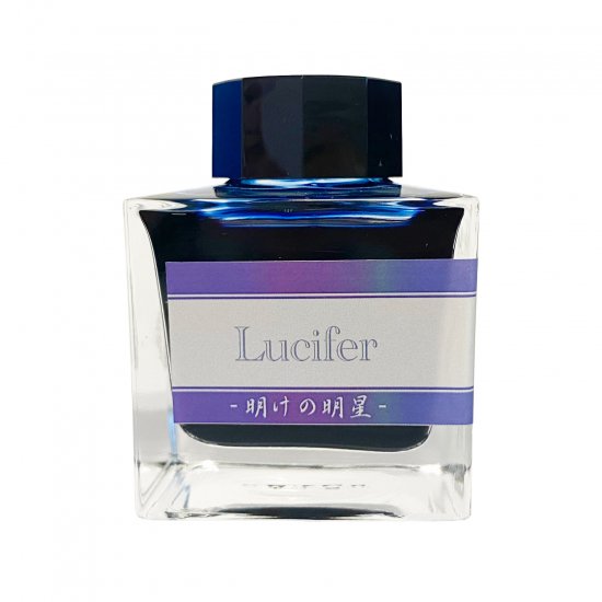 Glass bottle of fountain pen ink labeled "Lucifer" with a purple-striped label.