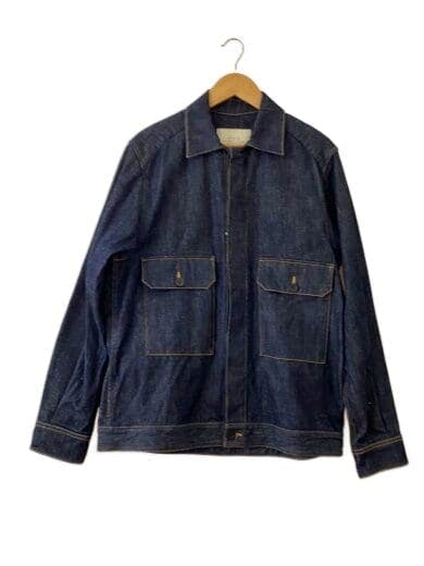 Front of a men's indigo denim jacket (size M) hanging on a wooden hanger against a white background.