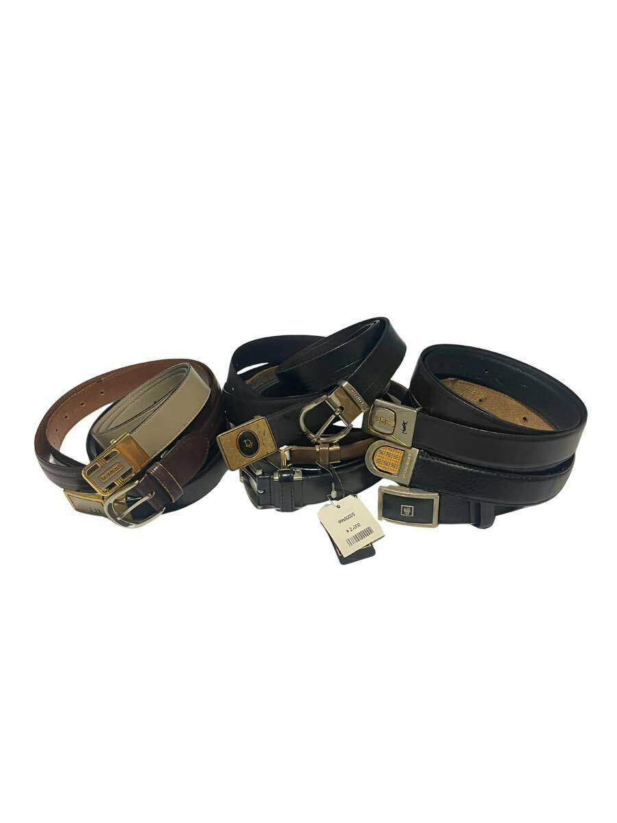 Several leather belts with different metal buckles arranged together on a white background.