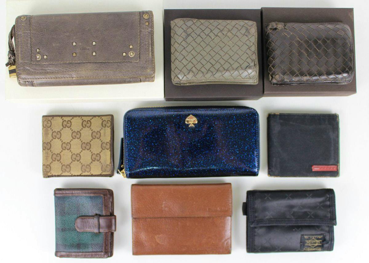 Nine wallets and small purses arranged in a grid on a white background, showing the set of nine items with a blue glitter zip-around wallet in the center.