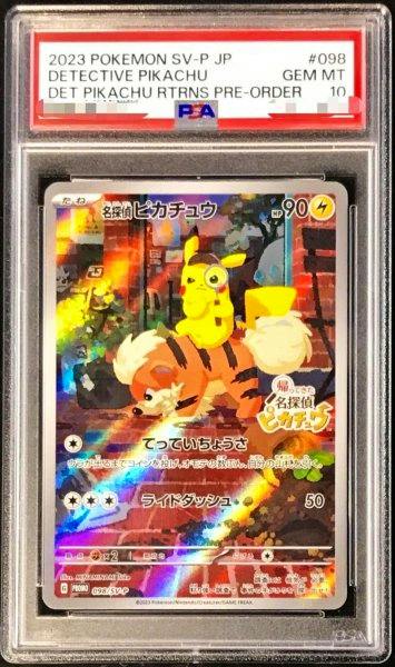Photograph of the PSA-graded Detective Pikachu trading card (SV-P #098) in its plastic slab showing the card artwork and the PSA label.