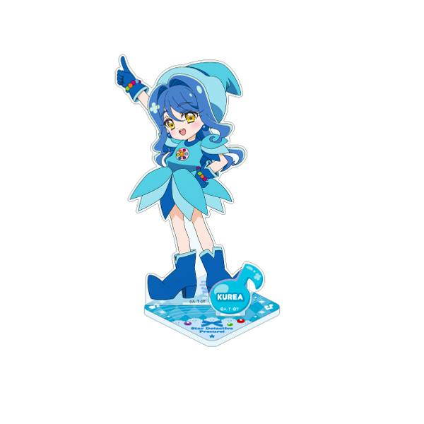 Acrylic stand of 帆羽くれあ from the 名探偵プリキュア！×おジャ魔女どれみ collaboration, showing the character in a blue outfit on a printed base.