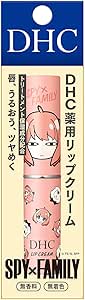 Front view of the pink DHC medicated lip balm tube with Anya character artwork alongside its packaging.