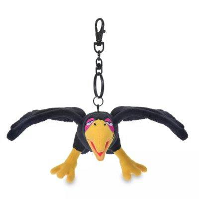 Plush Diablo keychain from Sleeping Beauty showing a black raven with a yellow beak and outstretched wings attached to a black clip.