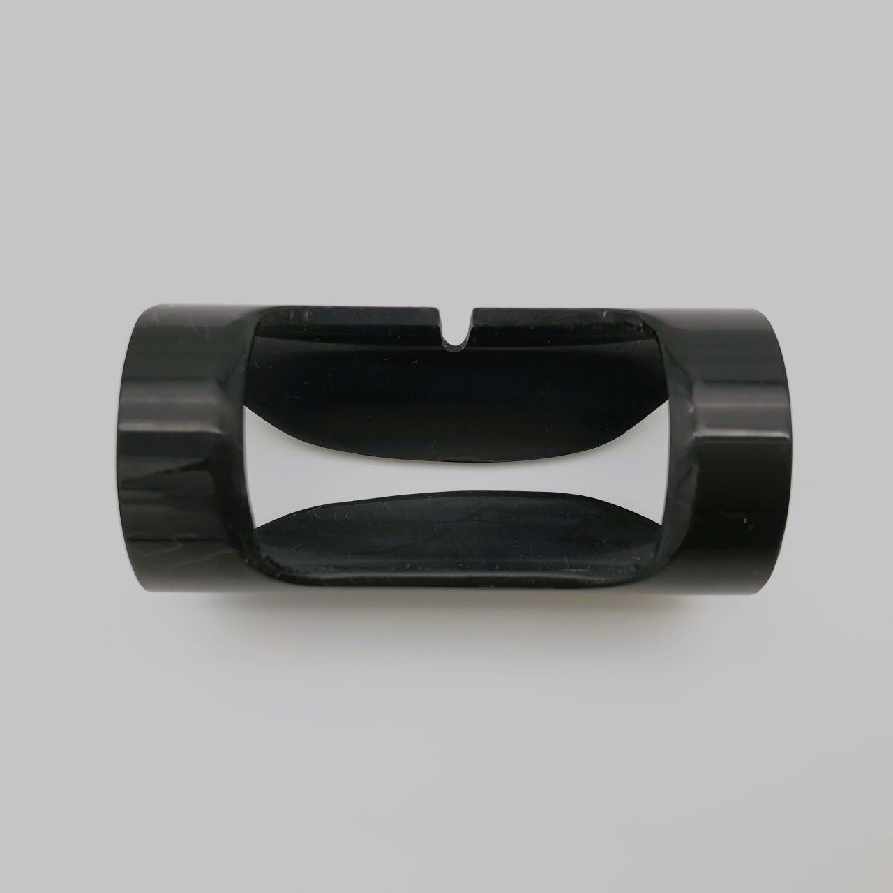 Top view of a black flute volume adjuster (didi Type03) showing its central cutout and notch.