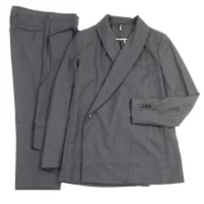 Gray Dior Homme jacket with shawl collar and matching trousers laid flat.