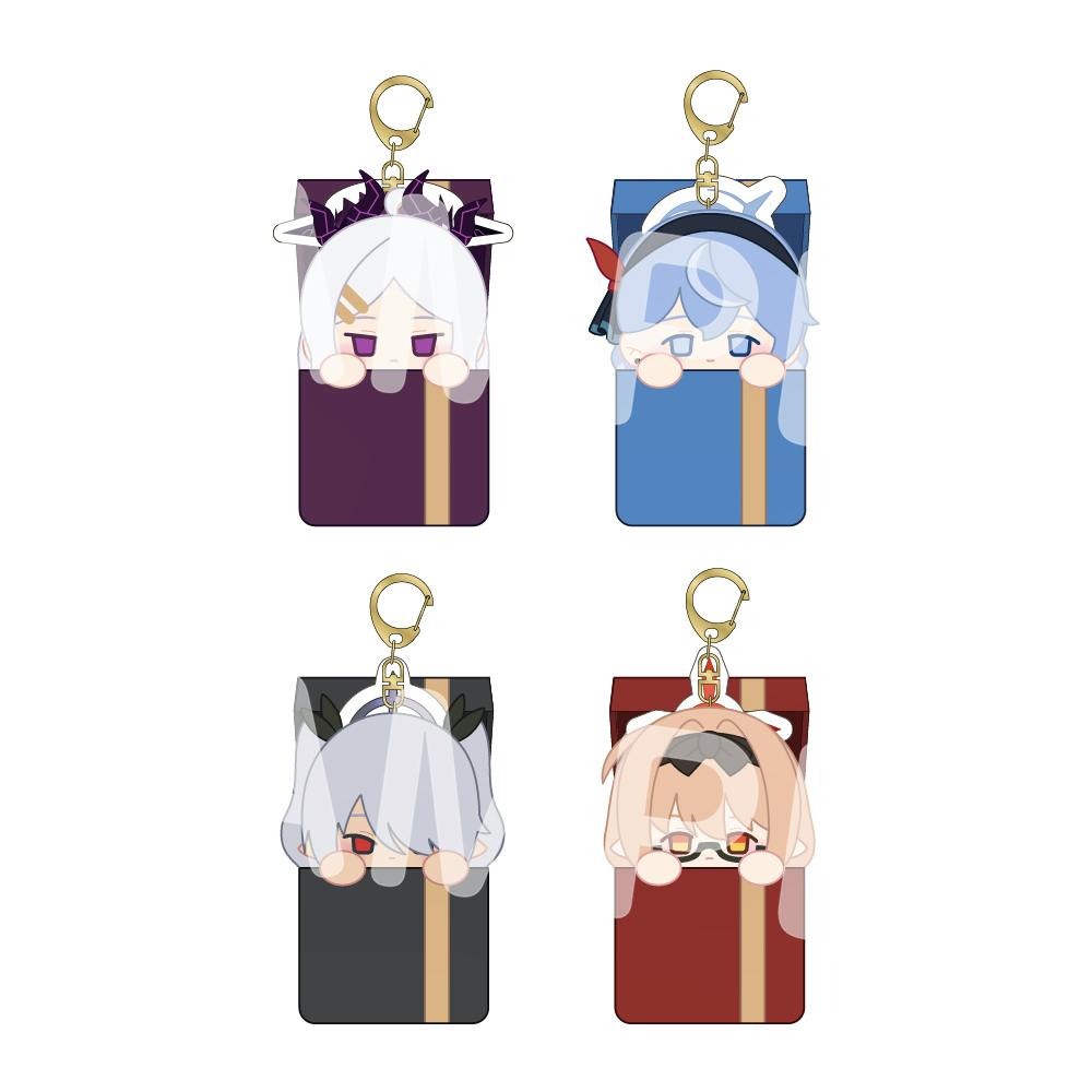 Four illustrated plush keychain charms shown in a 2x2 grid, each peeking out of a colored pocket on a white background.
