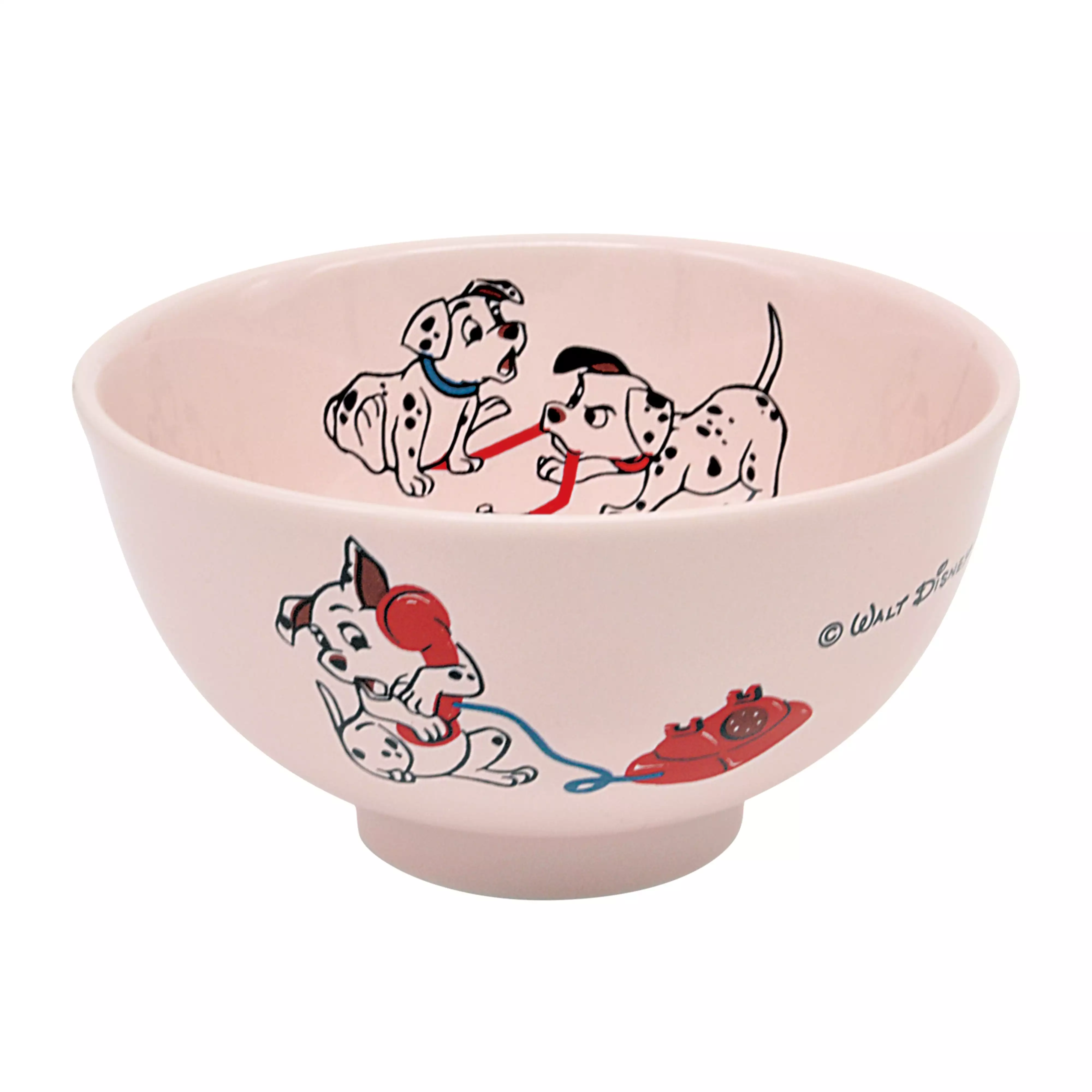 Pink porcelain bowl decorated with 101 Dalmatians illustrations on the inside and outside.