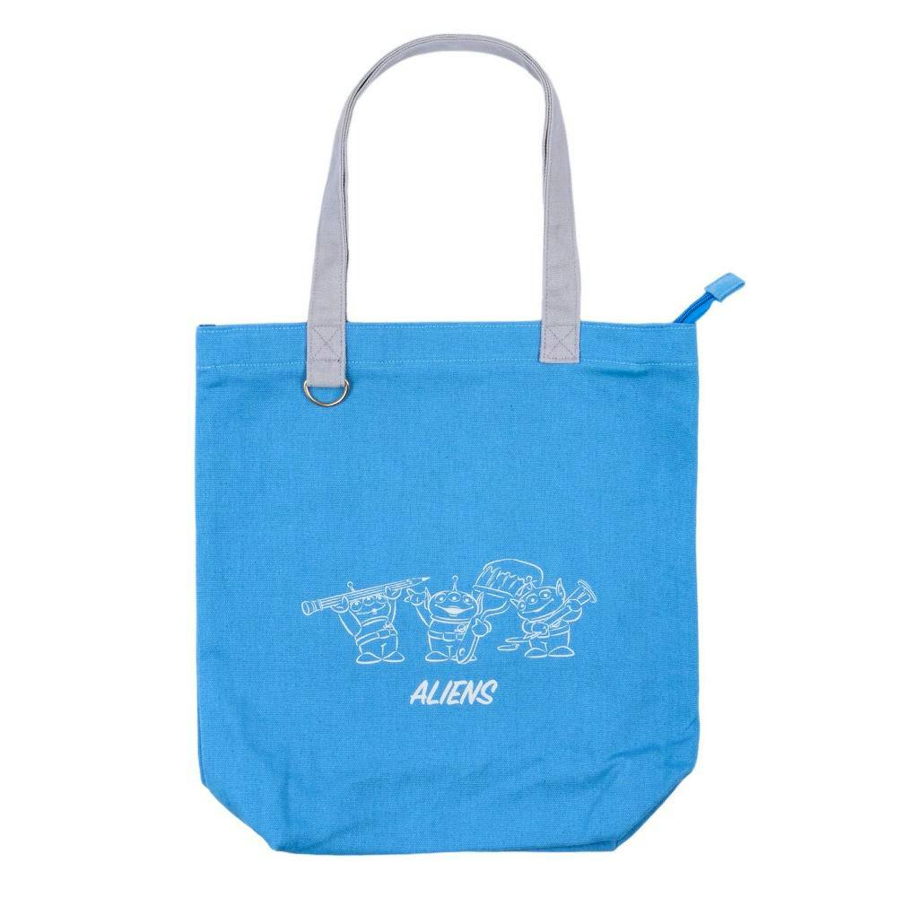Front view of the navy reusable tote bag with zipper and long handles, showing a white "ALIENS" print with three alien characters.