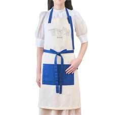 Front view of a person wearing a Disney apron in cream with navy-blue straps and a blue pocket.
