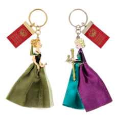 Two Frozen keychains (Anna and Elsa) with fabric skirts and metal key rings.