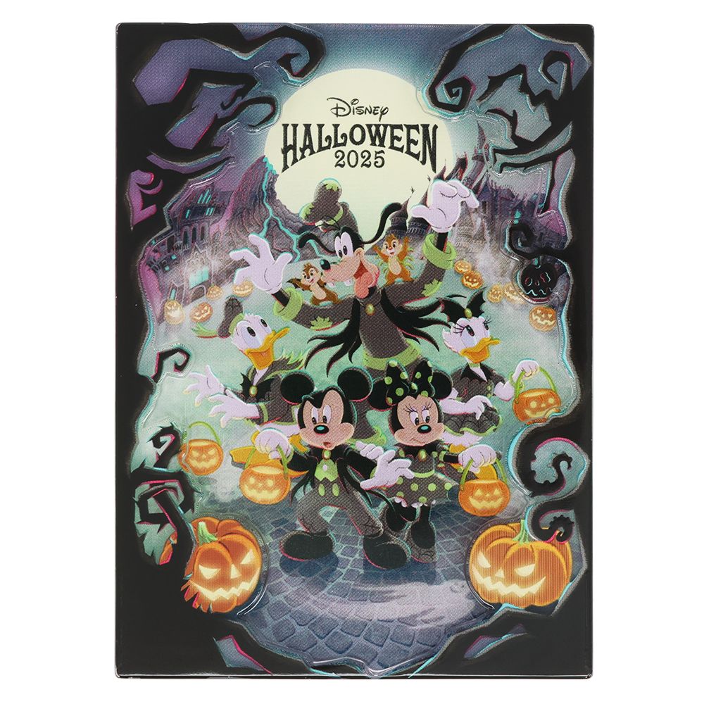 A Halloween-themed decorative magnet showing Mickey Mouse and friends in costumes with jack-o'-lanterns and a moonlit background.