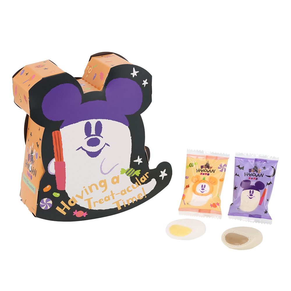A Disney Halloween-themed paper box for marshmallows displayed with two individually wrapped marshmallows and two unwrapped marshmallows.