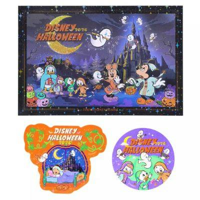 A Halloween-themed rectangular postcard and two stickers featuring Mickey Mouse and friends with ghosts and pumpkins.