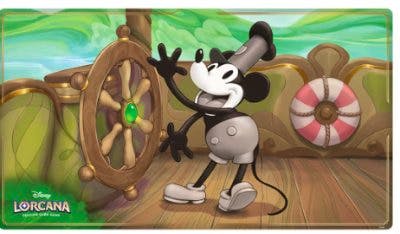 Rectangular playmat image showing Mickey Mouse as a steamboat helmsman at a wooden ship's wheel on a deck with a lifebuoy and green background.