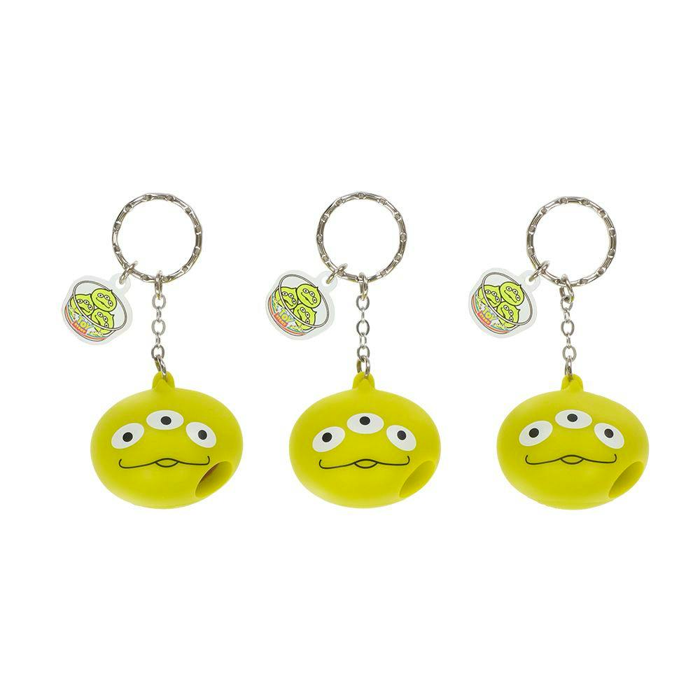 Three Little Green Men keychains with three eyes each shown on a white background.
