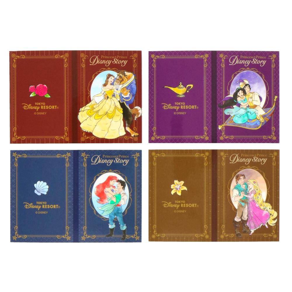 Four Disney Princess memo pads displayed with illustrated decorative covers showing different princess scenes.