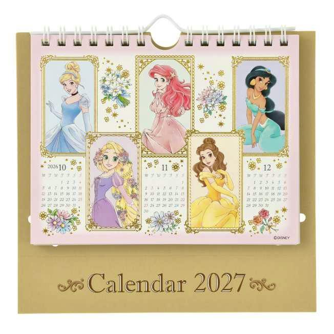 A Disney Princess desk calendar for 2027 showing illustrated princess panels and a gold-colored stand.