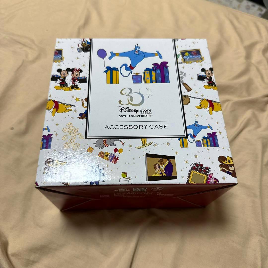 Top view of the Disney Store Japan 30th Anniversary accessory case box showing character illustrations and an "ACCESSORY CASE" label.