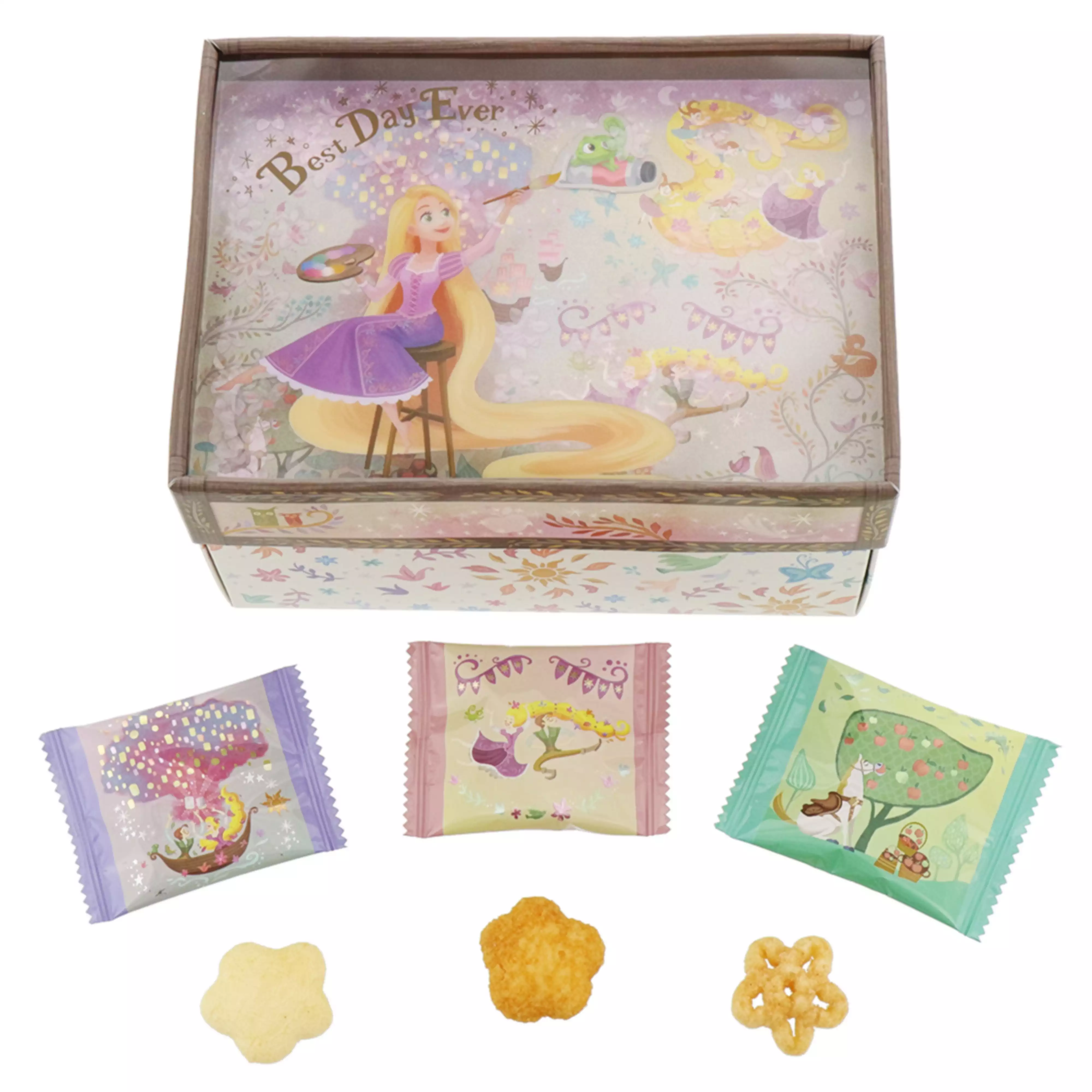 Rapunzel-themed paper box of rice crackers and rice-flour snacks with three individually wrapped pieces and four crackers displayed.