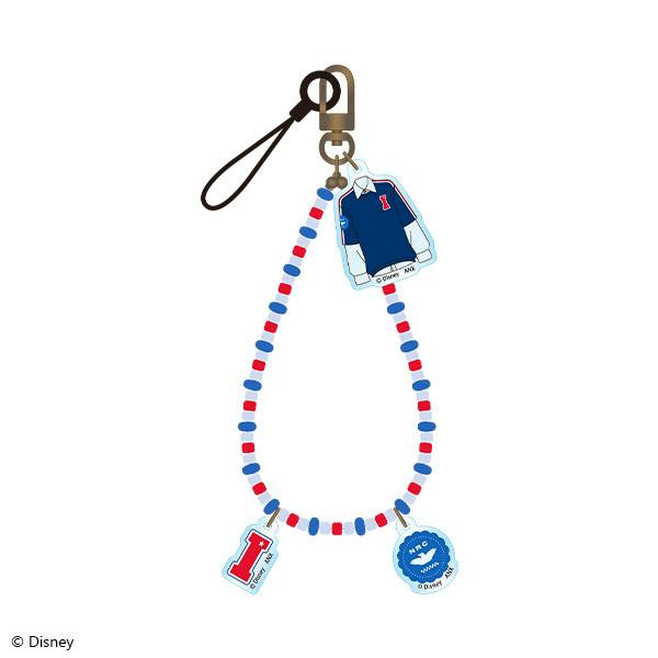 Phone strap with red, white, and blue beads and three attached plastic charms, including a blue jacket charm.