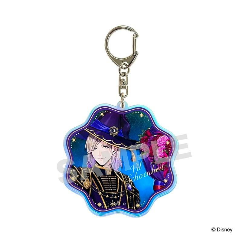 A decorative acrylic keychain of Vil from Disney Twisted-Wonderland showing the illustrated character in a witch hat inside a scalloped acrylic charm with an attached metal keyring.